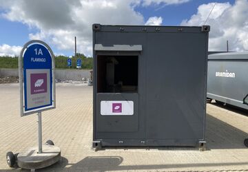 SK200 Screw Compactor for Compacting Post Consumer EPS in a container at a public recycling center
