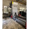 A SK370Twin for compacting fishboxes