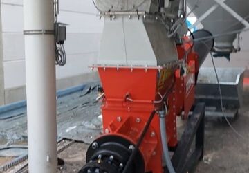 SK200 Screw Compactor for Compacting Post Consumer EPS in a container at a public recycling center
